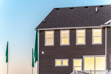 Sunlight reflecting on the windows of a house