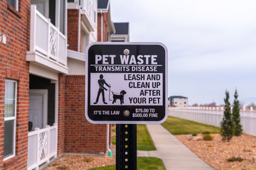 Pet Waste Transmits Disease warning notice day light