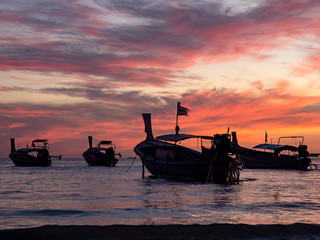 Traditional long-tail boat on the beach in Thailand