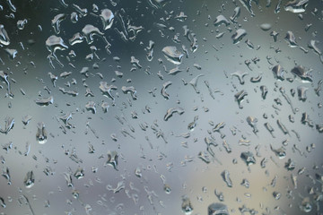 Blurred Water Droplets On Glass Mirror For Background