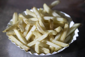 Freshly Fried Cooked French Fries In Paper Plate