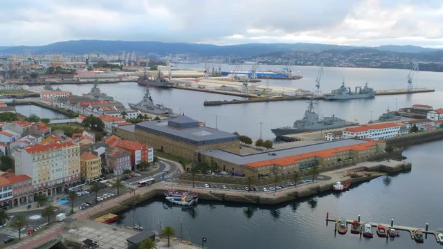 Ferrol harbour and docked military ships waiting for their next mission. Drone footage