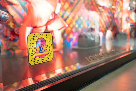 Bangkok, Thailand - January 3, 2020: Louis Vuitton puts the Snapchat's QR code in front of the shop, so customers can follow them by scanning the Ghost with Snapchat on a phone.