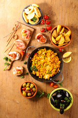 assorted of spanish food, tapas, paella and mussel