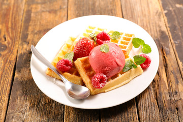 waffle with fruit and ice cream in plate