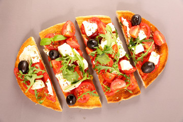 bruschetta with tomato, mozzarella and olive