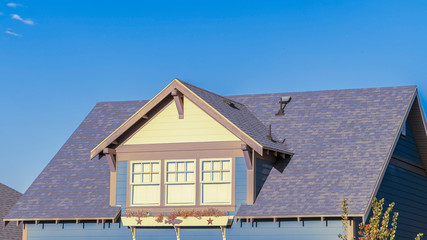 Panorama frame Large triple dormer window in an urban house