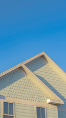 Vertical Textured decorative wall covering on timber house