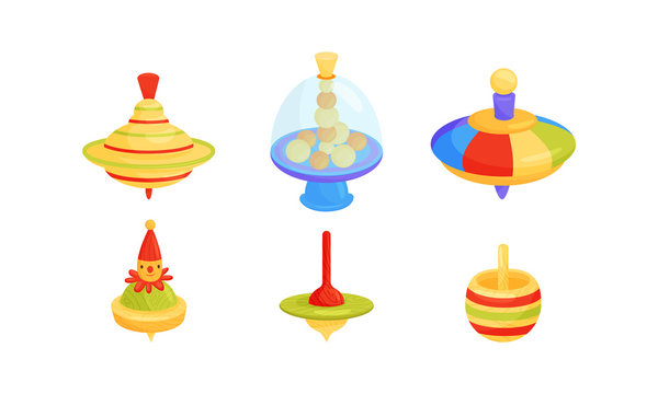 Whirligig Toy Vector Set. Colorful Childish Pegtop Collection