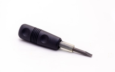 Screwdriver with black plastic handle isolated on white background