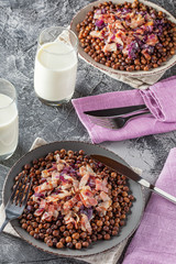 Traditional Latvia food, grey peas with bacon and onion, copy space