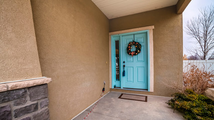 Panorama frame Colorful bright blue front door to a home