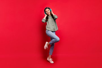 Full body photo of pretty lady using modern technology headphones ears listen popular youth songs...