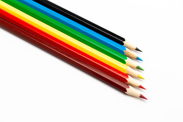 Colorful wooden pencils on a white background