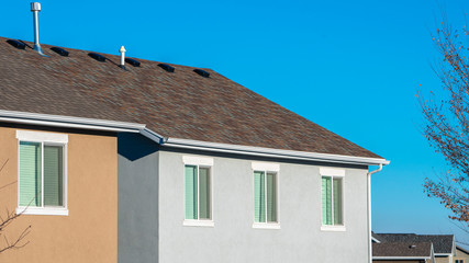 Obraz premium Panorama Upstairs windows in a double storey house