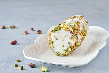Traditional arabic ice cream with pistachio  booza.   Close up   