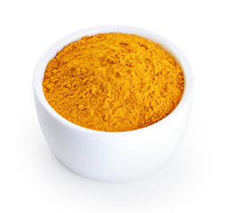 Bowl with turmeric powder isolated on white background.