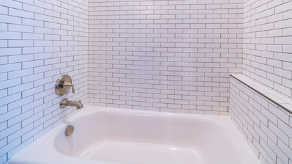 Panorama Clean white tiled shower combination tub bright interior