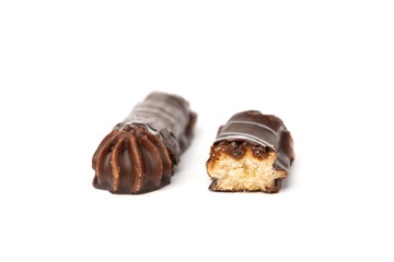 Shortbread cookies with caramel in chocolate glaze isolated on white background.