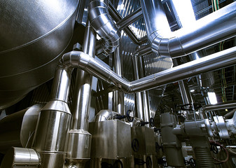 different size and shaped pipes and valves at a power plant