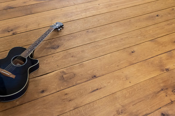 guitar on wooden floor background image