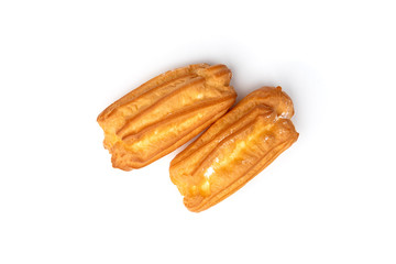 Traditional French dessert eclairs isolated on white background.