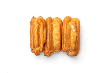 Traditional French dessert eclairs isolated on white background.