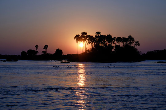 Sunset on the Zambesi river close to Victoria Falls, Zimbabwe