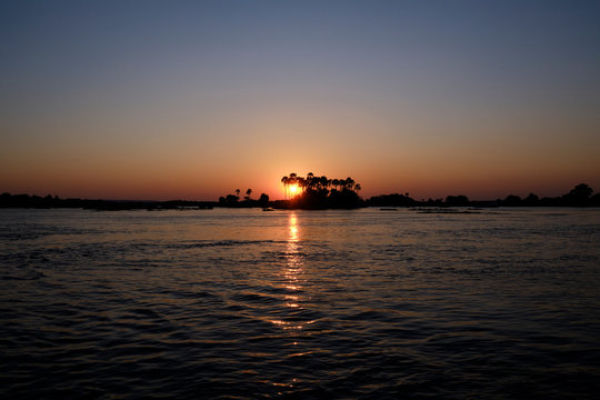 Sunset on the Zambesi river close to Victoria Falls, Zimbabwe