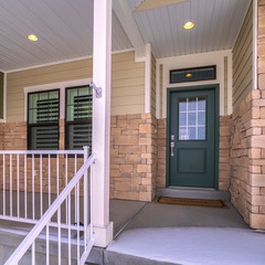 Square frame Snow covered front steps and porch day light