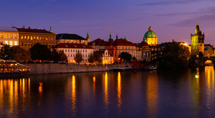 Fototapeta na wymiar Evening view of Charles Bridge with illumination. Prague. Czech Republic
