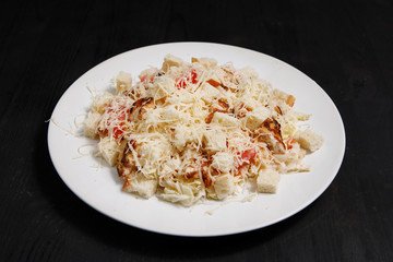 Plate of salad on the table.