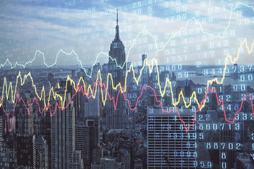Fototapeta premium Forex graph on city view with skyscrapers background double exposure. Financial analysis concept.