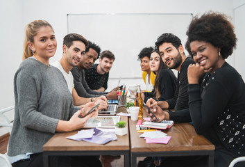 Multiethnic creative people having a brainstorming meeting.
