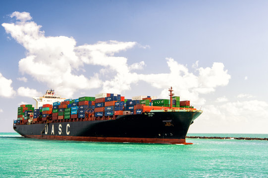 large cargo ship with shipping containers
