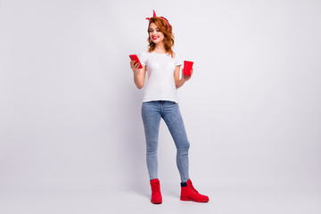 Full length body size view of her she nice attractive lovely cheerful cheery girl holding in hand...