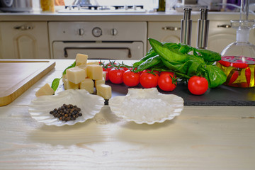 Parmigiano cheese with basil leaves, vegetables, olive oil and spices. Pesto Sauce Ingredients