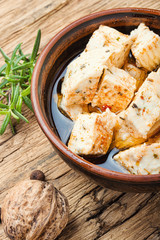 Homemade feta cheese with herbs