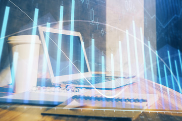 Forex Chart hologram on table with computer background. Double exposure. Concept of financial markets.