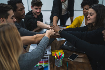 Obraz premium Team of work showing unity with their hand together.