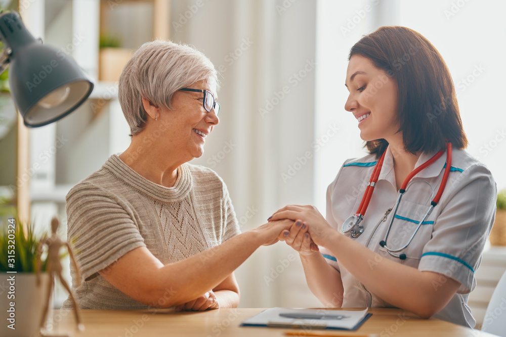 Wall mural patient listening to doctor