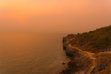 landscape of sunset at the sea. cliff path on sea in Koh Sichang, Chonburi, Thailand. 