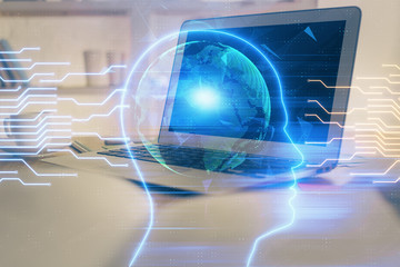 Multi exposure of work table with computer and brain hologram. Brainstorm concept.