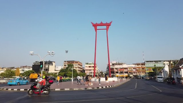 Giant swing or Sao Ching Cha landmark in Bangkok city, BANGKOK, THAILAND. With noise and burry bokeh background.