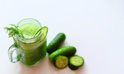 the process of making fresh juice or cucumber smoothies, detox smoothies and juices, weight loss diet