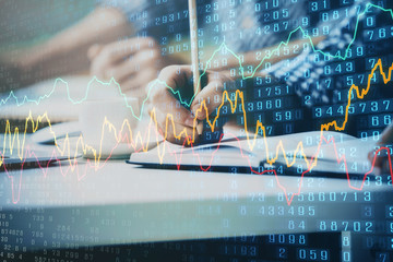 Multi exposure of two men planing investment with stock market forex chart.