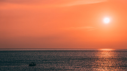 Sunset with a fishing boat, Cinque Terre, Italy