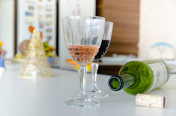 Wine goblet, empty wine bottle after New Year's Eve, New Year 2020, alcohol problem, red wine, bachelorette party, alcoholic and alcoholism and addiction, awkward night and fun, cork party, party nigh