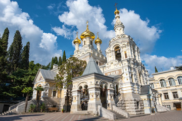 Fototapeta na wymiar St. Alexander Nevsky Cathedral with golden domes on a sunny day, Yalta.