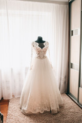 white wedding dress on mannequin